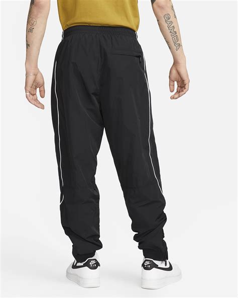 nike herren khaki|Nike Solo Swoosh Men's Track Pants.